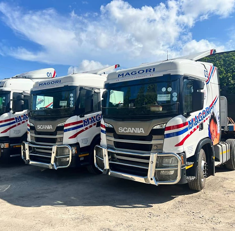 Magori Logistics trucks parked side by side at the yard