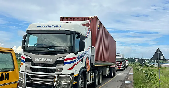 Magori Logistics trucks with containers on the highway